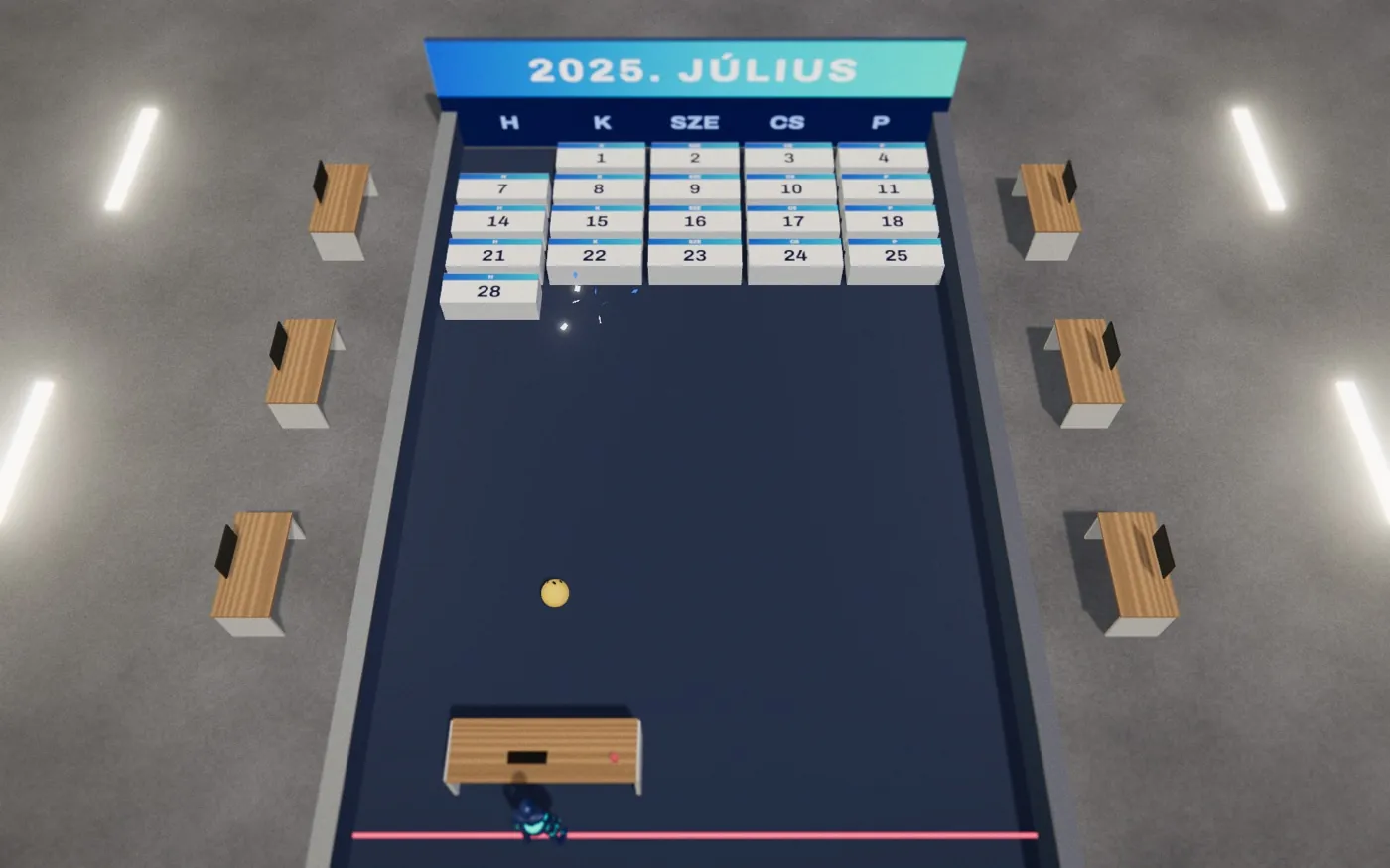 Felülnézet: naptártéglákból álló fal július napjaival „2025. július” felirat alatt, egy sárga stresszlabda és egy íróasztal ütőként